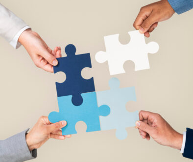 hands-holding-puzzle-business-problem-solving-concept
